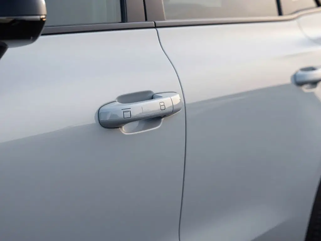 Close-up of Volvo EV exterior showing smooth surface transitions and aerodynamic details